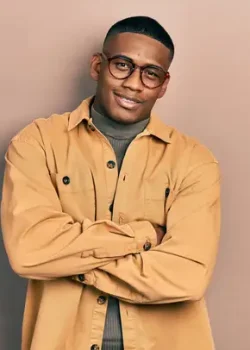 stock-photo-young-black-man-wearing-casual-clothes-glasses-happy-face-smiling